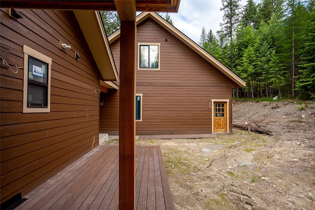 view of side of home featuring a deck