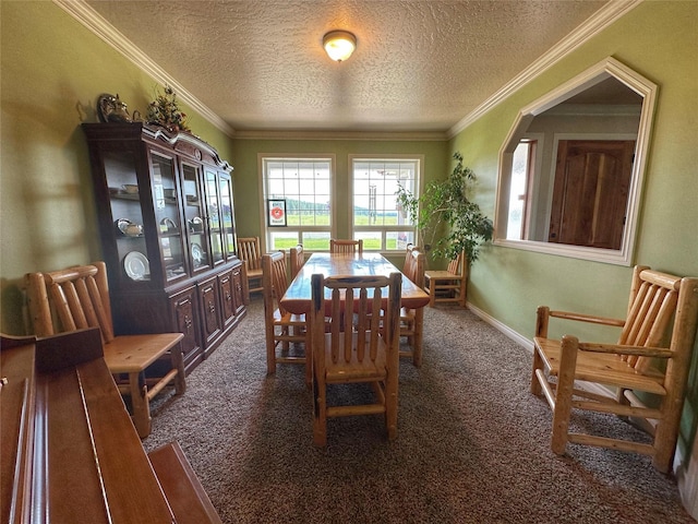 carpeted dining space with crown molding and a textured ceiling