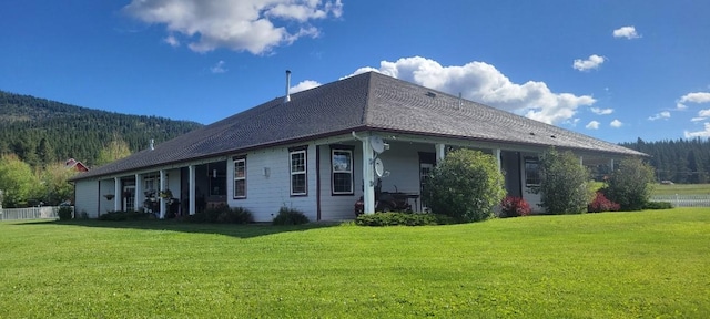 exterior space featuring a front lawn