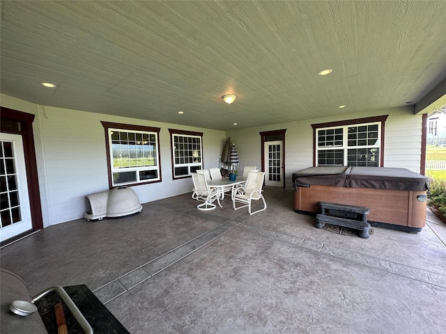 view of patio / terrace featuring a hot tub