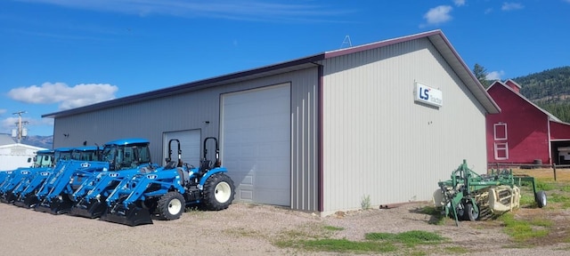 view of outbuilding featuring a garage