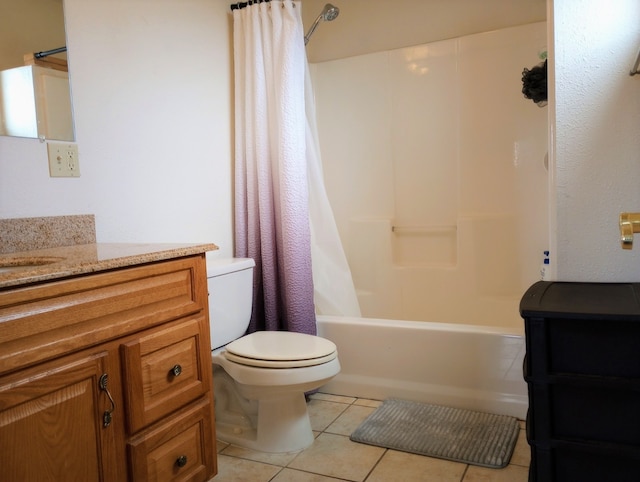 full bathroom featuring shower / bath combo, tile floors, toilet, and vanity