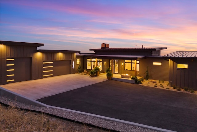 view of front of property with a garage