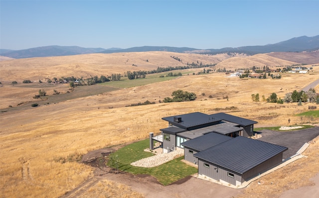 aerial view featuring a mountain view and a rural view