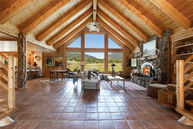 tiled living room with beam ceiling, high vaulted ceiling, and a fireplace