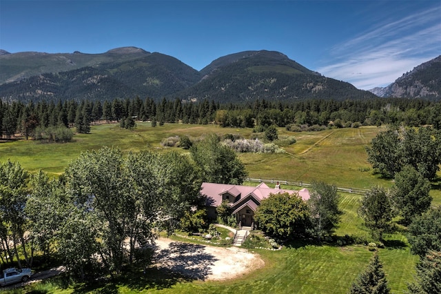 mountain view featuring a rural view