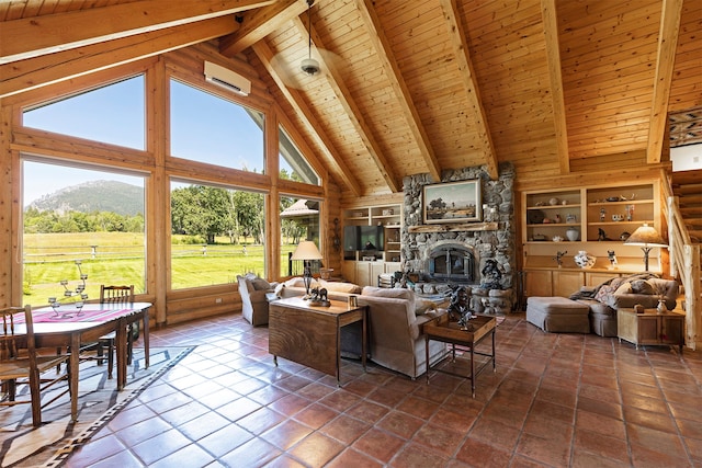 tiled living room with high vaulted ceiling, a mountain view, wooden ceiling, beamed ceiling, and a stone fireplace