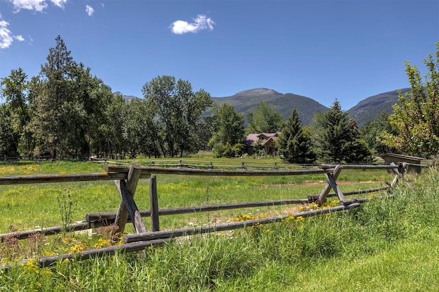 view of mountain feature with a rural view