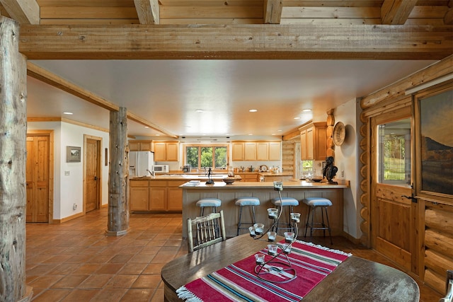 tiled dining area with wooden ceiling