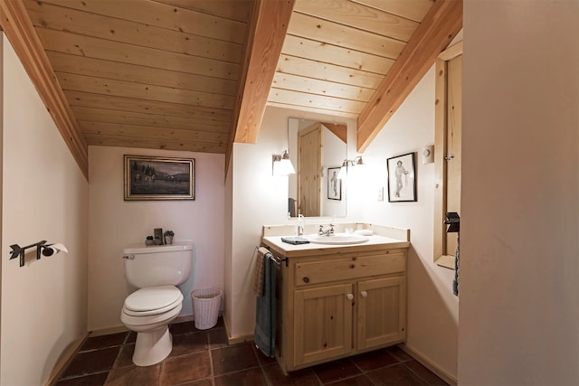 bathroom featuring lofted ceiling, tile flooring, vanity with extensive cabinet space, toilet, and wood ceiling