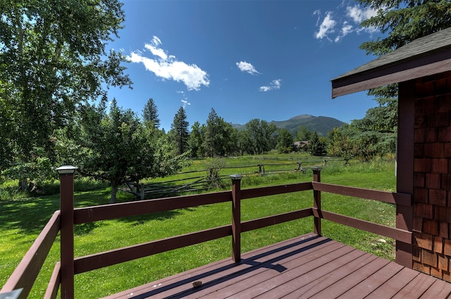 deck featuring a yard