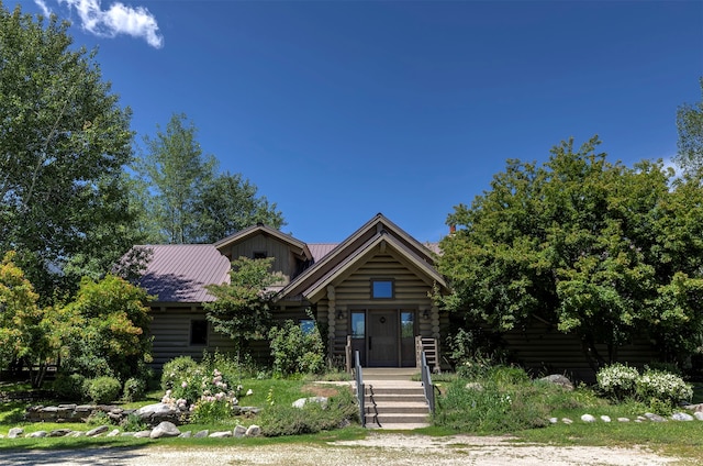 view of log-style house