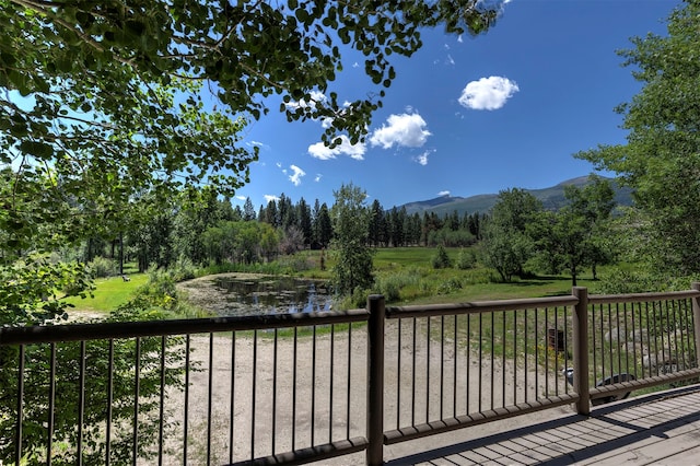 deck featuring a water view