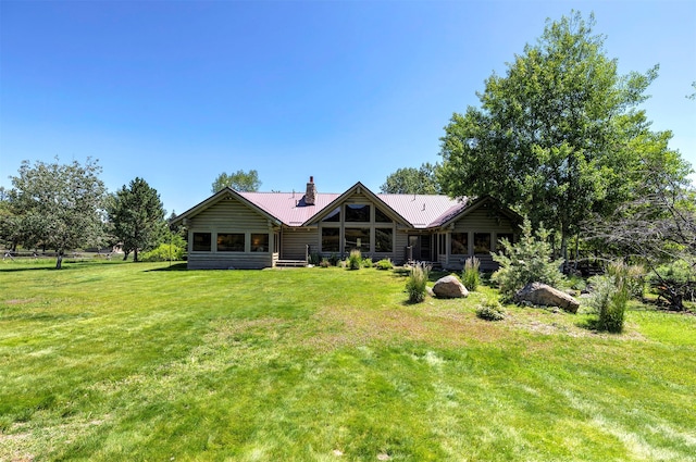 view of front of home with a front yard