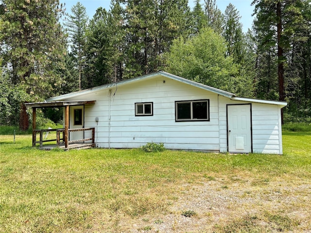 exterior space featuring a lawn