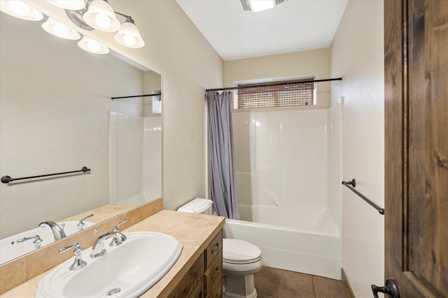 full bathroom with tile flooring, toilet, vanity, and shower / bath combo