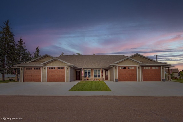 view of front of home with a garage