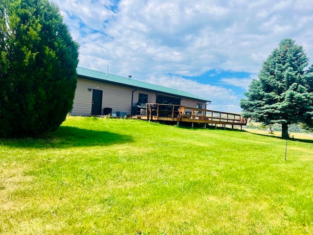 view of yard featuring a deck