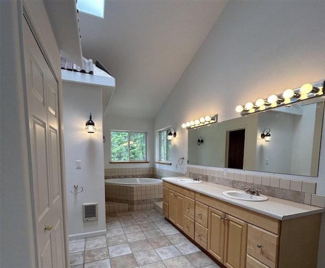 3971 Glen Lake Rd, Eureka, MT 59917 - full bath with vaulted ceiling, double vanity, and a bath