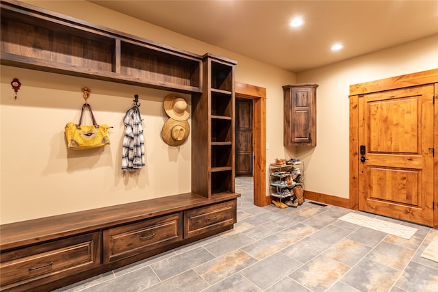 mudroom with tile patterned flooring