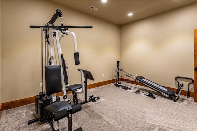 workout room featuring carpet floors