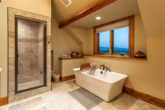 bathroom featuring tile patterned flooring, beam ceiling, and plus walk in shower