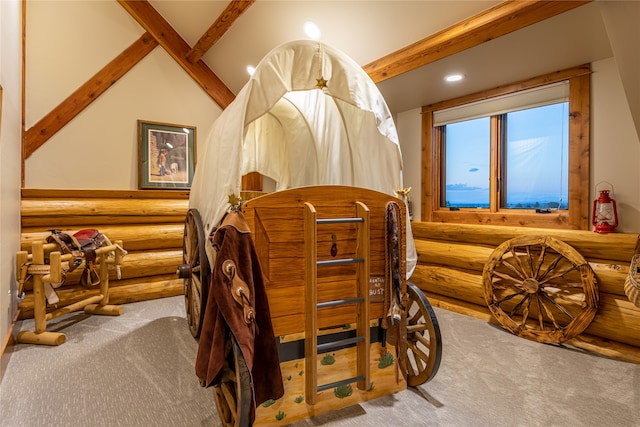 carpeted bedroom with vaulted ceiling with beams and log walls