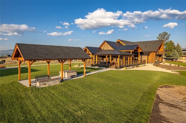 exterior space with a yard and a gazebo