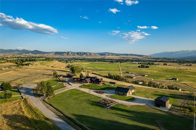 aerial view featuring a mountain view and a rural view