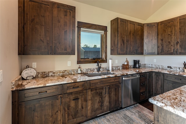 kitchen featuring vaulted ceiling, sink, dark brown cabinets, light stone countertops, and dishwasher