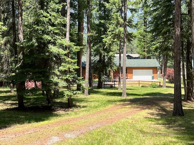 view of yard featuring a garage