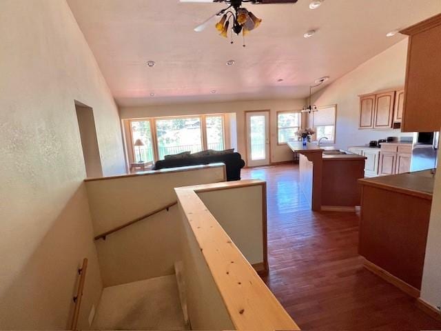 5 Osprey Dr E, Thompson Falls, MT 59873 - staircase featuring lofted ceiling, wood finished floors, and ceiling fan