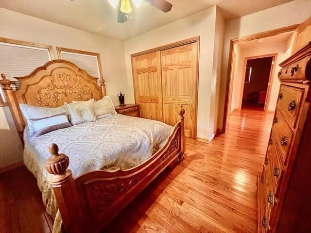 5 Osprey Dr E, Thompson Falls, MT 59873 - bedroom featuring light wood-type flooring, a closet, and ceiling fan
