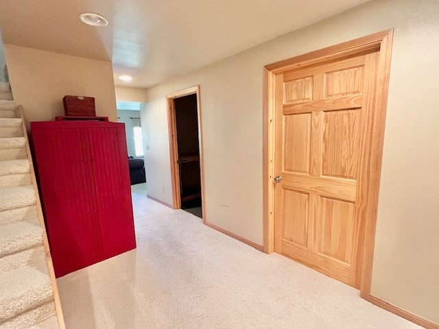 corridor with carpet floors