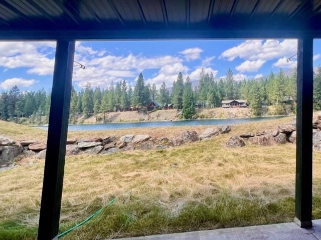 5 Osprey Dr E, Thompson Falls, MT 59873 - view of green lawn with a water view