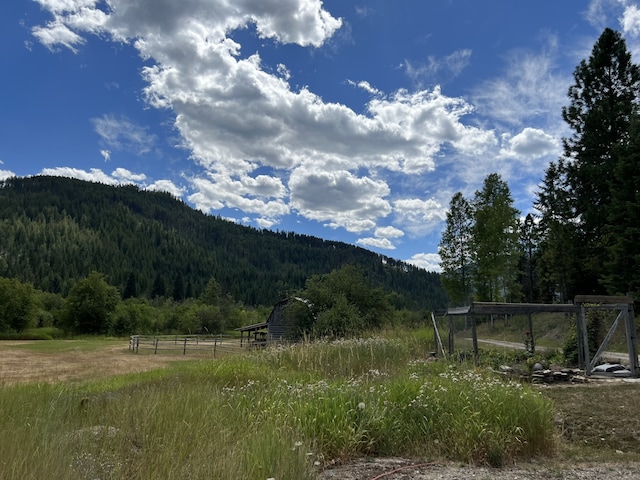 view of mountain feature with a rural view