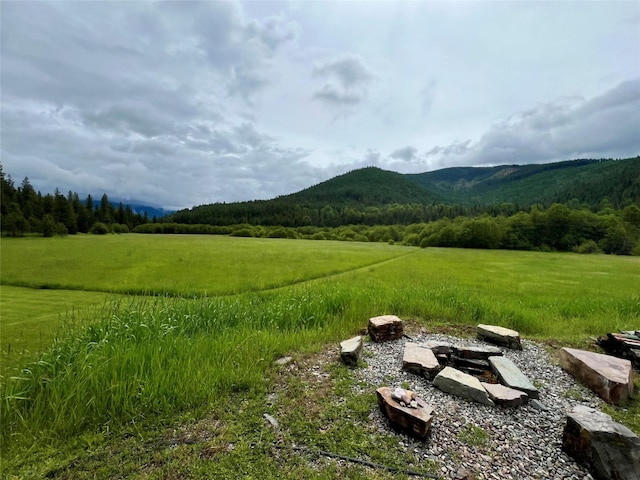 property view of mountains featuring a rural view