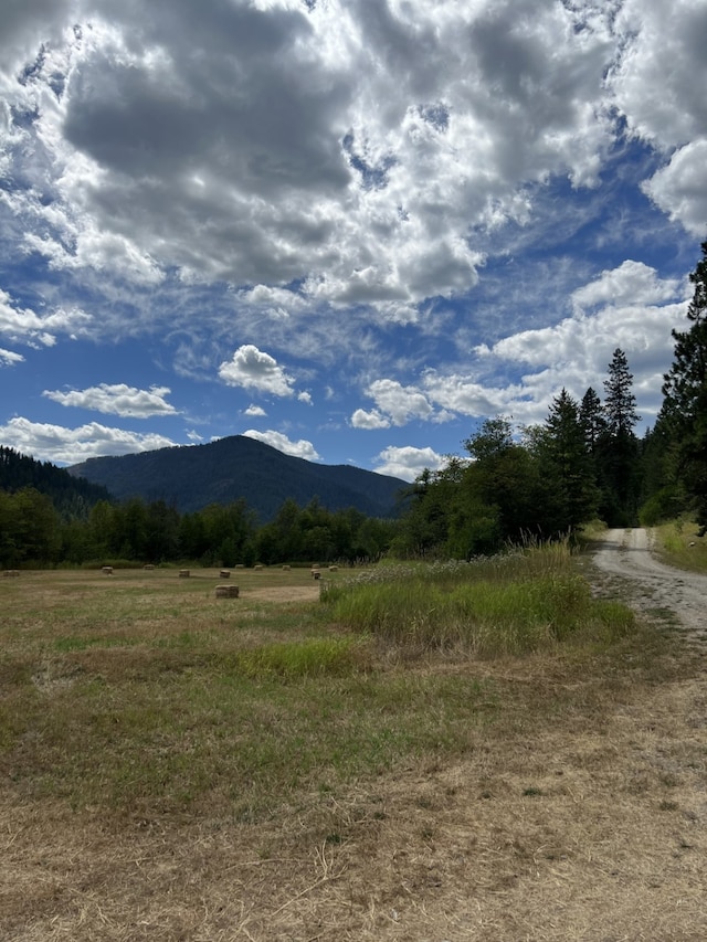 view of mountain feature with a rural view