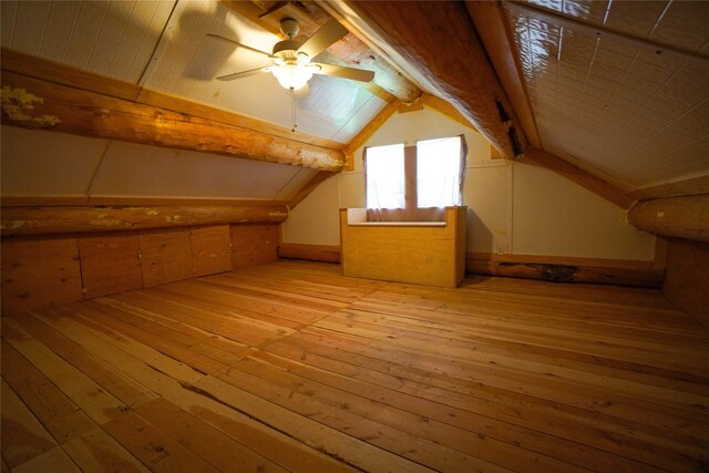 additional living space featuring lofted ceiling, ceiling fan, and light hardwood / wood-style flooring