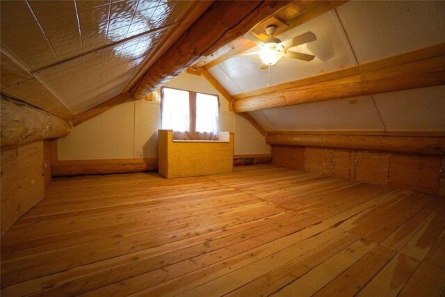 bonus room with light hardwood / wood-style floors, ceiling fan, and lofted ceiling