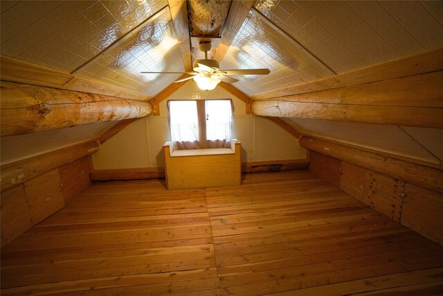 bonus room with ceiling fan and light hardwood / wood-style floors