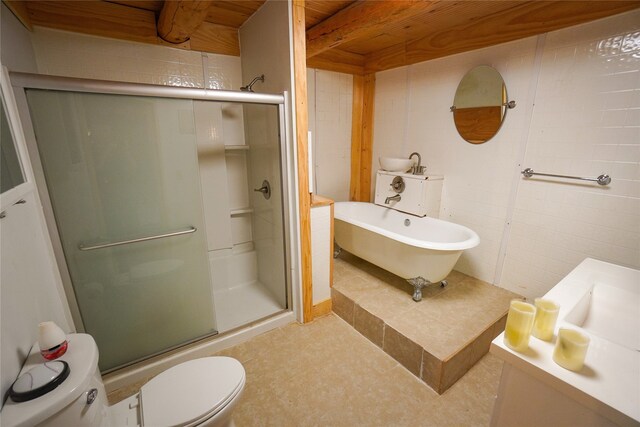 bathroom with a shower with door, tile flooring, and toilet