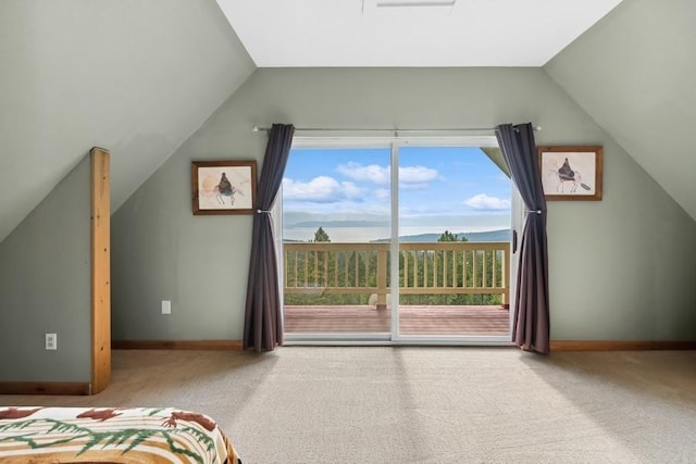 bonus room featuring vaulted ceiling, carpet, a mountain view, and baseboards