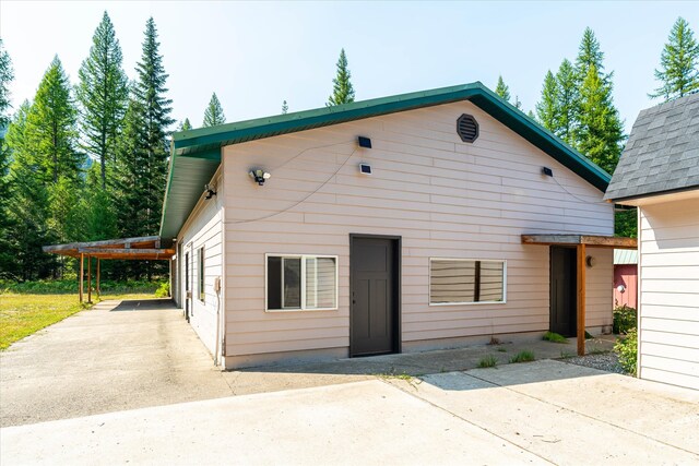 view of front of house featuring a carport