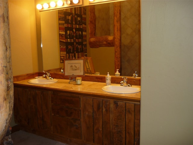 bathroom featuring double vanity