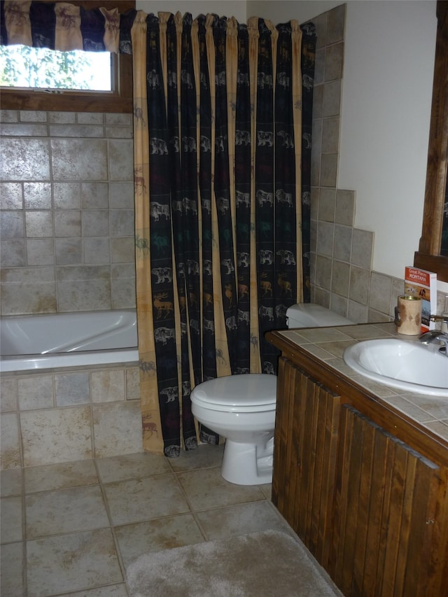 full bathroom with shower / tub combo, vanity, toilet, and tile patterned flooring