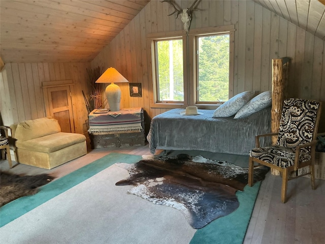 1350 Summit Park, Seeley Lake, MT 59868 - bedroom featuring lofted ceiling, wooden walls, hardwood / wood-style flooring, and wooden ceiling