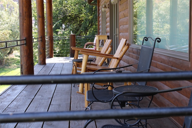 rear view of property with a lawn