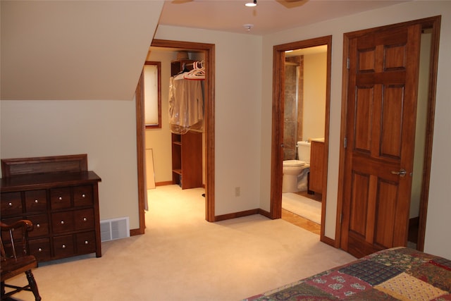 bedroom featuring light colored carpet