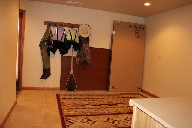 laundry area featuring cabinets, electric panel, light carpet, and separate washer and dryer